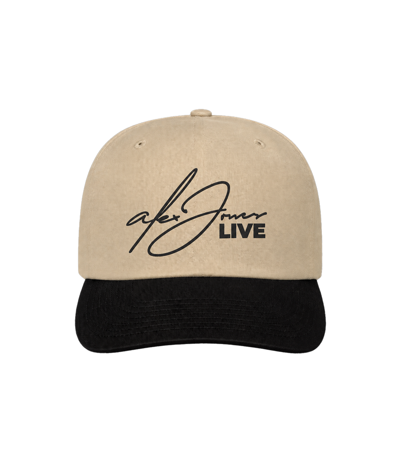 The Alex Jones Store - Tan and black Alex Jones Live Signature Trucker Hat with cursive 'Alex Jones LIVE' script embroidered on the front