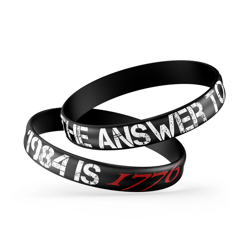 The Alex Jones Store - Black silicone wristbands stacked, white and red 'The Answer To 1984 Is 1776' Alex Jones design