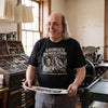 Benjamin Franklin wearing the George's Demolition Services t-shirt in black