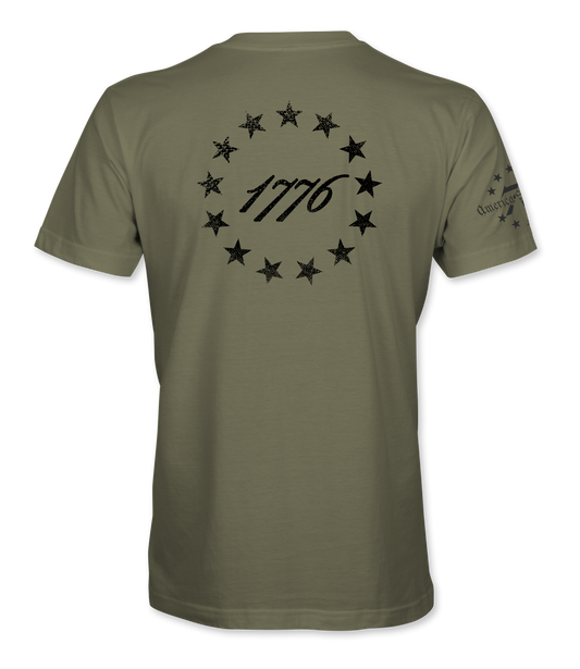 The Alex Jones Store - Back of olive green 1776 America Supply Co t-shirt with black 13-star Betsy Ross ring around 1776 numerals