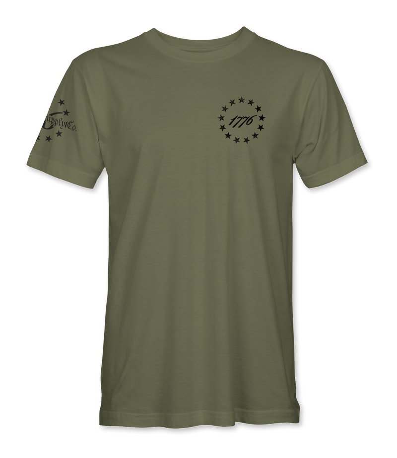 The Alex Jones Store - Front of olive green 1776 America Supply Co t-shirt with small left-chest Betsy Ross ring and 1776 numerals