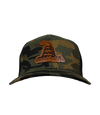 The Alex Jones Store - Front view of camo America Supply Co Gadsden leather patch trucker hat with coiled rattlesnake design on black mesh