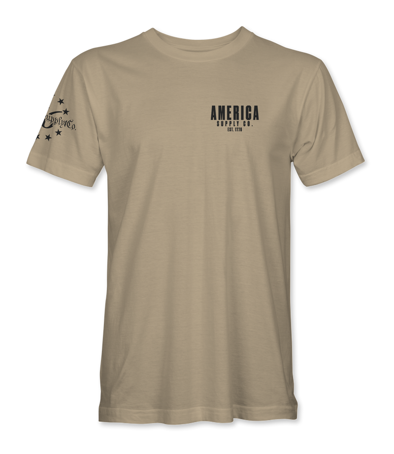 The Alex Jones Store - Front of tan America Supply Co Hunting Dog t-shirt with small left-chest America Supply Co Est. 1776 logo
