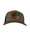 The Alex Jones Store - Front view of olive green Strength & Honor leather patch trucker hat with Betsy Ross flag and slogan on black mesh