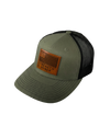 The Alex Jones Store - Angled view of olive green Strength & Honor leather patch trucker hat with black mesh side panels and curved brim