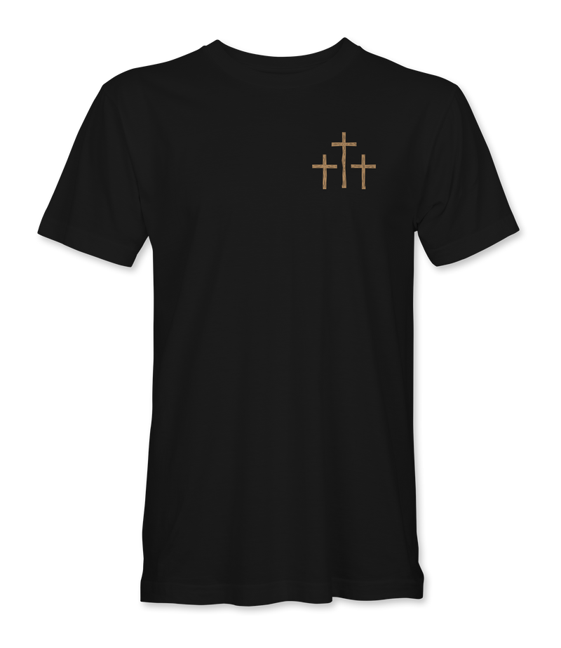 The Alex Jones Store - Front of black 'A Lot Can Happen In Three Days' t-shirt with small tan three-crosses graphic at left chest