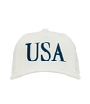 The Alex Jones Store - White 'USA' Premium Trucker Hat with navy serif USA lettering on structured front panel, front view