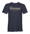 The Alex Jones Store - navy Operation Northwoods t-shirt with a globe-and-fighter-jet roundel beside OPERATION NORTHWOODS, with PLANNED. EXECUTED. DENIED. underneath