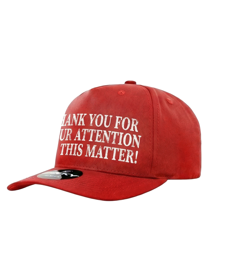 The Alex Jones Store - Red 'Thank You For Your Attention To This Matter!' trucker hat three-quarter view with white embroidered front text