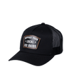The Alex Jones Store - Black trucker hat three-quarter view with 'Support Your Local ICE Raids' leather patch on front and mesh back