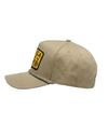 The Alex Jones Store - Side profile of tan America Supply Company patch cap with rope brim trim and curved visor on plain background