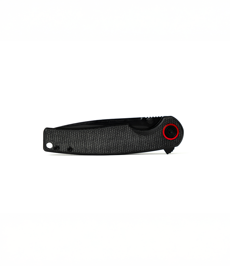 The Alex Jones Store - Closed Alex Jones Micarta Handle Blade showing black micarta grip, red pivot ring accent and slim everyday carry profile
