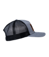 The Alex Jones Store - Heather grey and black trucker hat, right side view, featuring leather American flag patch on the front panel