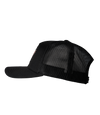 The Alex Jones Store - Left side view of all-black Deus Vult Patriot's Crest trucker hat with black mesh back and pre-curved visor