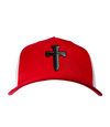 The Alex Jones Store - Front view of red and white Deus Vult Cross Nails trucker hat with black leatherette cross-of-nails patch on crown