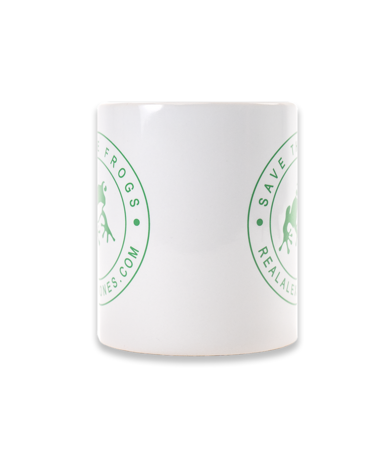 The Alex Jones Store - White ceramic Save The Frogs coffee mug left side view showing green frog seal logo wrapping around the body