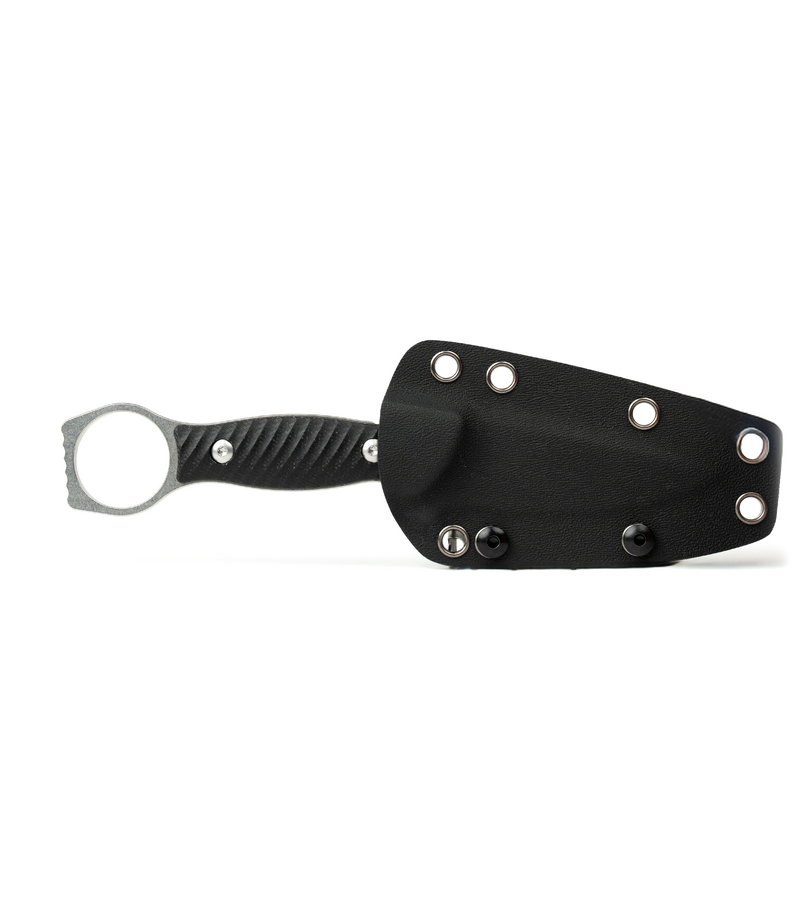 The Alex Jones Store - Alex Jones Ring Blade in black Kydex sheath, reverse showing molded retention and mounting eyelets with ring pommel out