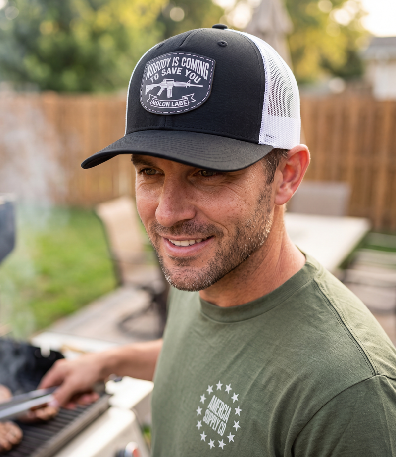 Nobody Is Coming To Save You Trucker Hat