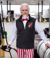 Live Free Or Die Full-Zip Fleece Vest in black, worn at a truck stop