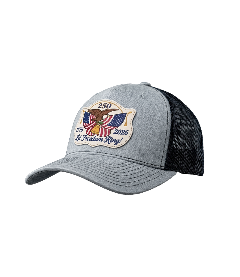 The Alex Jones Store - Side view of gray and black America 250 'Let Freedom Ring' patch trucker hat with eagle and dual flag design