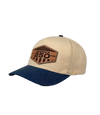 The Alex Jones Store - Side view of cream and navy America 250 patch hat showing leather hexagonal patch with '1776 2026' dates