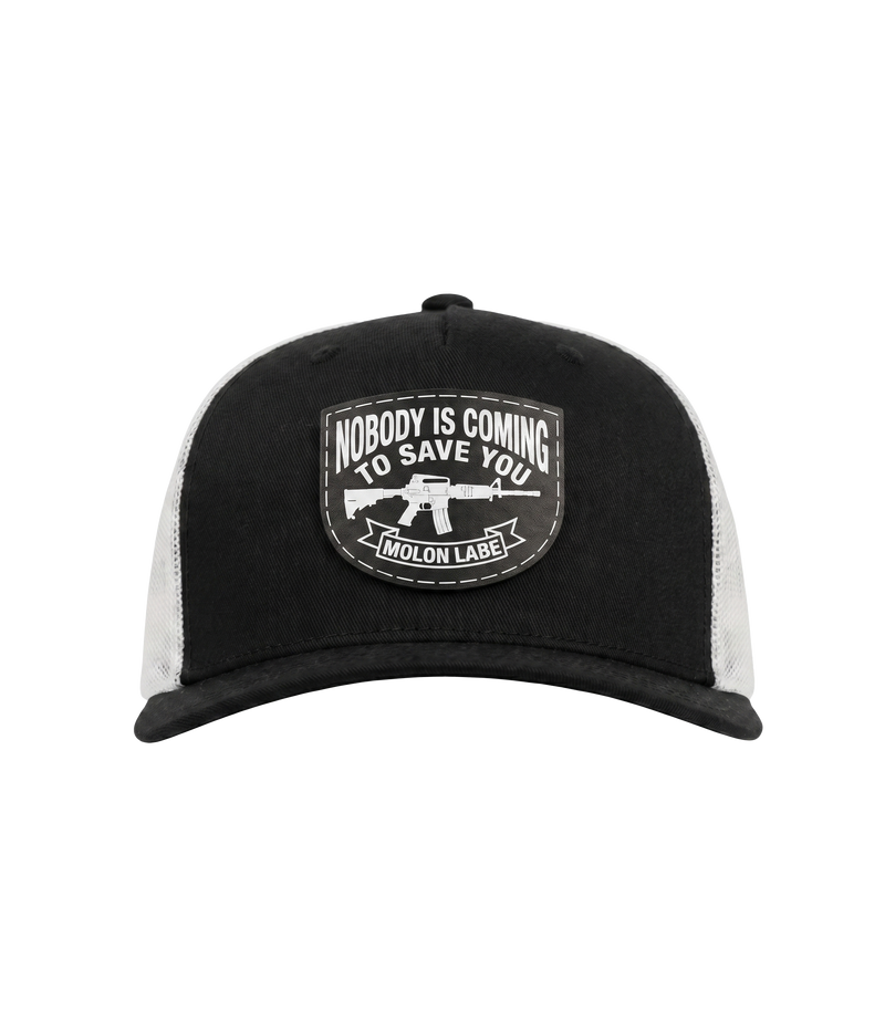 The Alex Jones Store - Front of black and white Nobody Is Coming To Save You trucker hat with stitched Molon Labe rifle patch on black front panel and white mesh back
